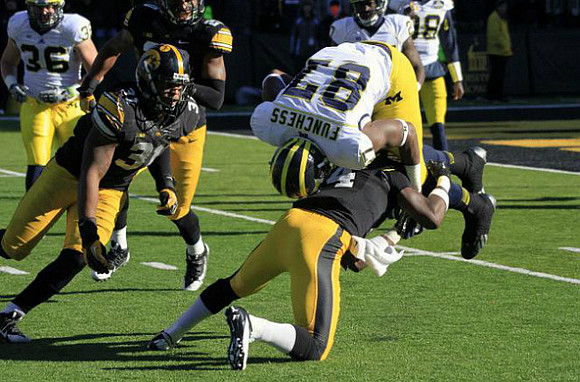 Joe Kerridge (36), Devin Funchess (87), Derrick Green (27), and Devin Gardner (98)