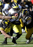 Graham Glasgow (61) and Devin Gardner (98)