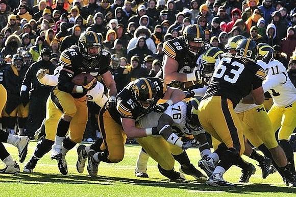 Quinton Washington (76) and Courtney Avery (11)