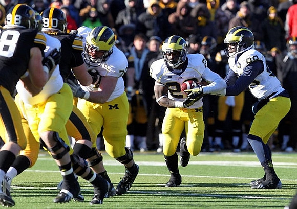 Erik Magnuson (78), Fitzgerald Toussaint (28), and Devin Gardner (98)