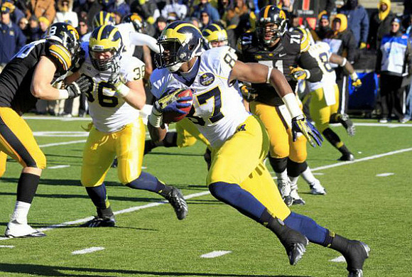 Joe Kerridge (36) and Devin Funchess (87)