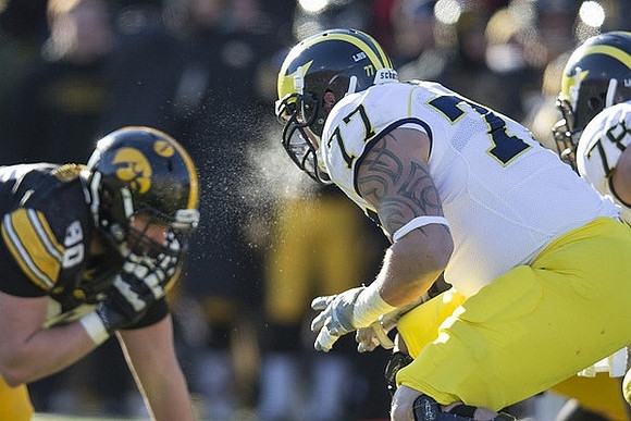 Taylor Lewan (77) and Erik Magnuson (78)