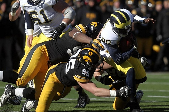 Devin Gardner (98) and Graham Glasgow (61)