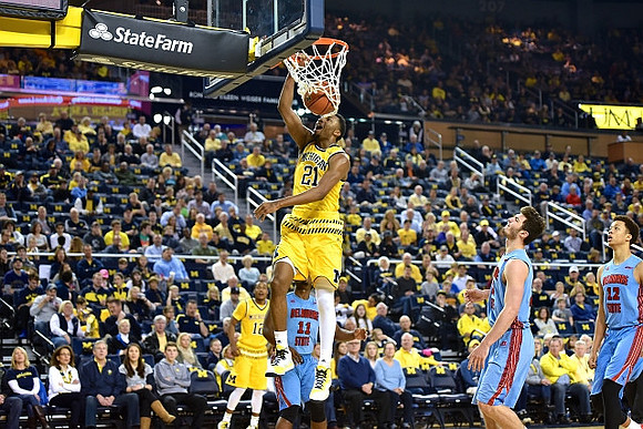 Muhammad-Ali Abdur-Rahkman (12) and Zak Irvin (21)