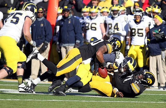 Michael Schofield (75) and Devin Gardner (98)