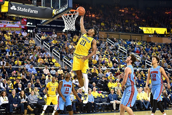 Muhammad-Ali Abdur-Rahkman (12) and Zak Irvin (21)