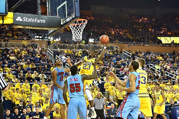 Caris LeVert (23), Moritz Wagner (13), and Aubrey Dawkins (24)
