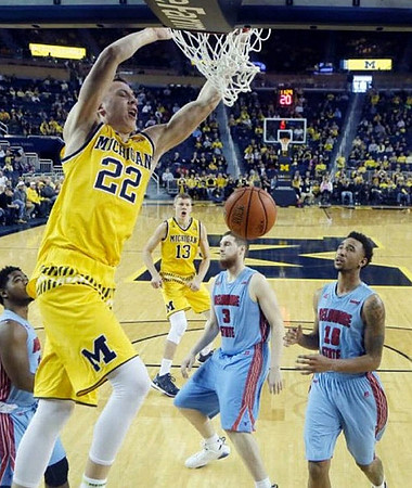 Duncan Robinson (22) and Moritz Wagner (13)