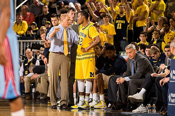 John Beilein, Muhammad-Ali Abdur-Rahkman (12), and Jeff Meyer