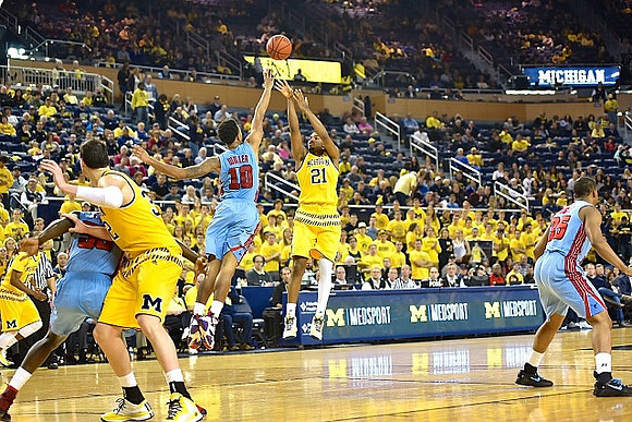 Muhammad-Ali Abdur-Rahkman (12), Ricky Doyle (32), and Zak Irvin (21)