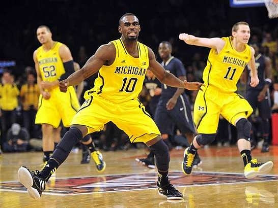 Jordan Morgan (52), Tim Hardaway Jr. (10), and Nik Stauskas (11)