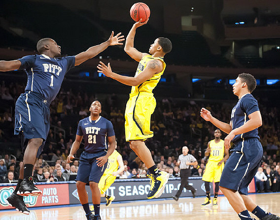 Trey Burke (3) and Tim Hardaway Jr. (10)
