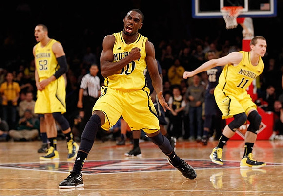 Jordan Morgan (52), Tim Hardaway Jr. (10), and Nik Stauskas (11)