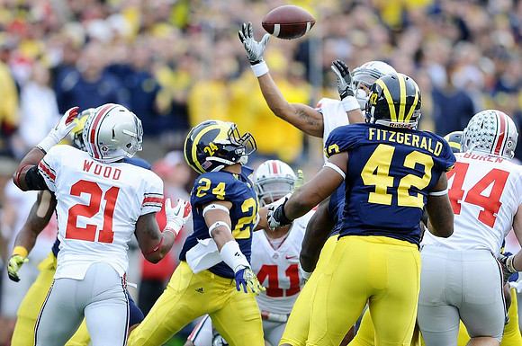 Delonte Hollowell (24) and J.B. Fitzgerald (42)