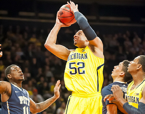 Jordan Morgan (52) and Glenn Robinson III (1)