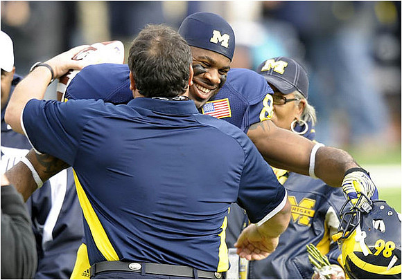 Brady Hoke and Kevin Koger (86)