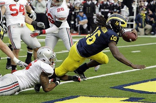 Denard Robinson (16)