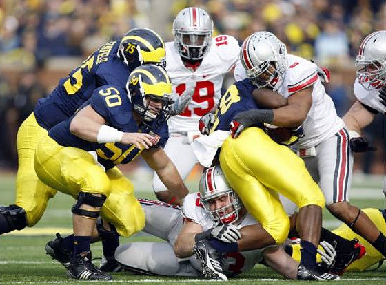 Michael Schofield (75), David Molk (50), and Fitzgerald Toussaint (28)