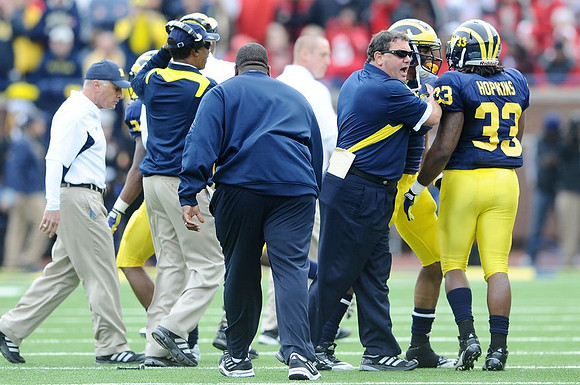 Fred Jackson, Brady Hoke, and Stephen Hopkins (33)