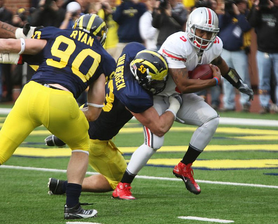 Jake Ryan (90) and Ryan Van Bergen (53)
