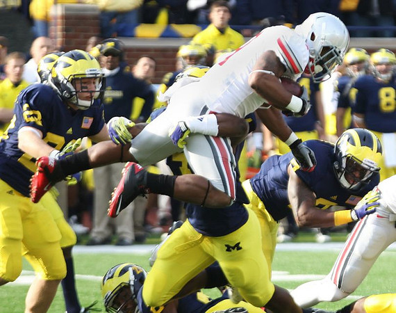 Matthew Cavanaugh (28), Floyd Simmons (23), and Brandin Hawthorne (7)