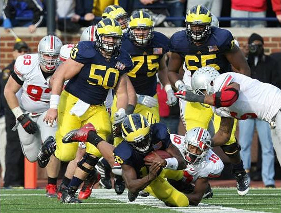 Denard Robinson (16), David Molk (50), Michael Schofield (75), and Patrick Omameh (65)