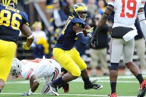 Kevin Koger (86) and Junior Hemingway (21)