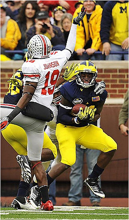 Kevin Koger (86) and Junior Hemingway (21)