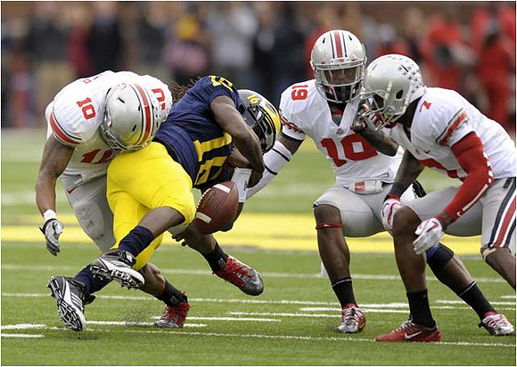 Denard Robinson (16)