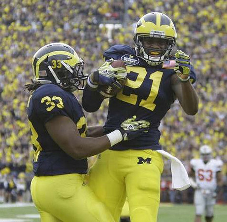 Stephen Hopkins (33) and Junior Hemingway (21)