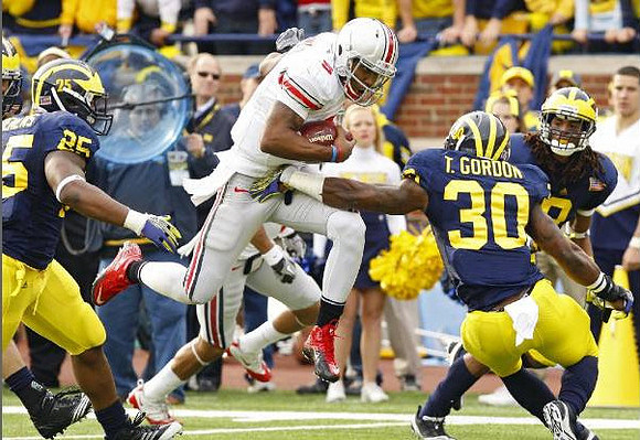 Kenny Demens (25), Thomas Gordon (30), and J.T. Floyd (8)