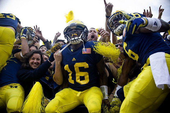 Denard Robinson (16) and Raymon Taylor (6)