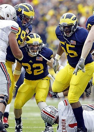 Will Heininger (39), Jordan Kovacs (32), and Jibreel Black (55)