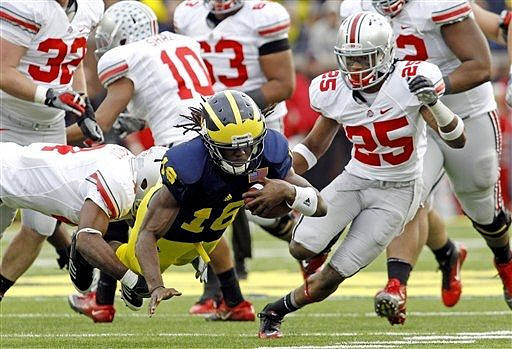 Denard Robinson (16)
