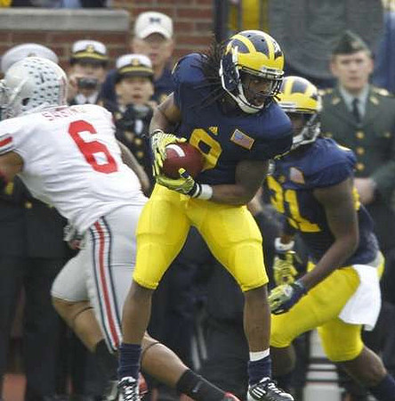 Martavious Odoms (9) and Junior Hemingway (21)