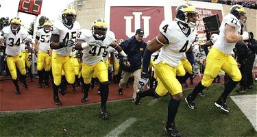 Darnell Hood, Jake Long, Obi Oluigbo, Lloyd Carr, David Harris, Will Paul, and Adam Kraus
