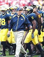 Lloyd Carr, B.J. Opong-Owusu (38), and David Underwood (5)