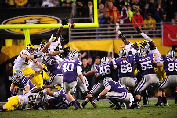 Jourdan Lewis (26), Jake Ryan (47), Chris Wormley (43), and Raymon Taylor (6)