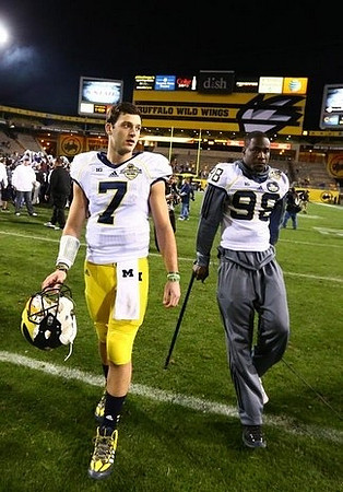 Shane Morris (7) and Devin Gardner (98)