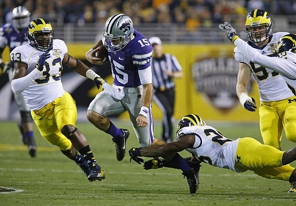 Taco Charlton (33), Dymonte Thomas (25), Brennen Beyer (97), and Jarrod Wilson (22)