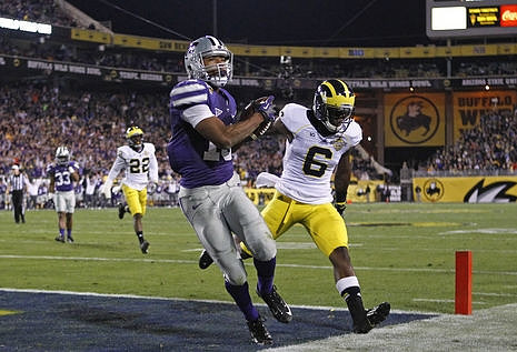 Jarrod Wilson (22) and Raymon Taylor (6)