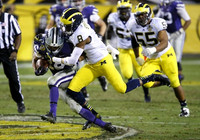 Channing Stribling (8), Mario Ojemudia (53), and Jibreel Black (55)