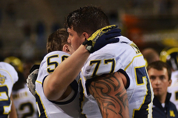 Jack Doyle (59) and Taylor Lewan (77)