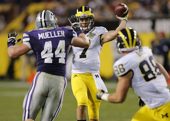 Shane Morris (7) and Jake Butt (88)
