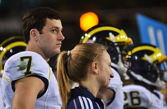 Shane Morris (7) and Jourdan Lewis (26)