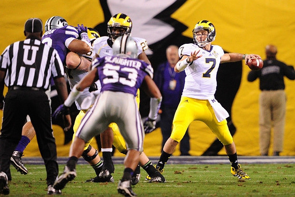 Fitzgerald Toussaint (28) and Shane Morris (7)