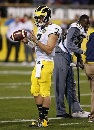 Shane Morris (7) and Devin Gardner (98)