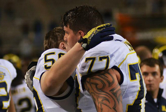 Jack Doyle (59) and Taylor Lewan (77)