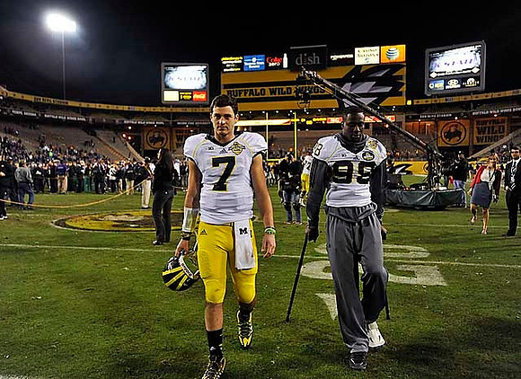 Shane Morris (7) and Devin Gardner (98)