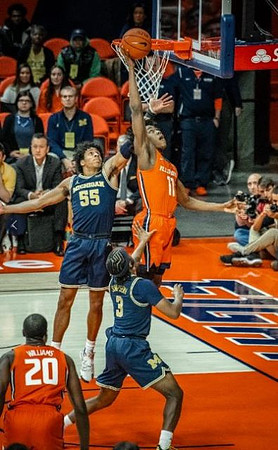 Eli Brooks (55) and Zavier Simpson (3)